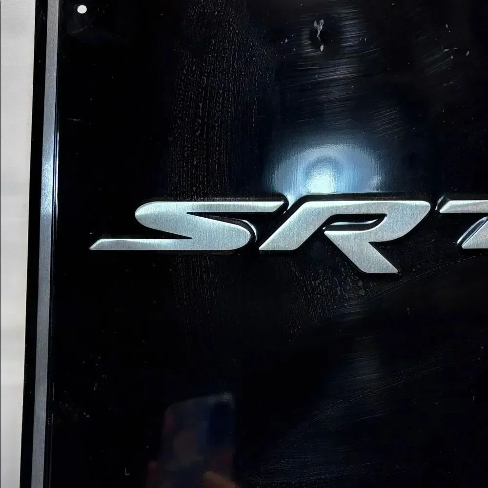 SRT Black and Silver Metal Sign